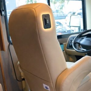 RV captain chair with upper seat control button used for custom RV seat cover cutouts