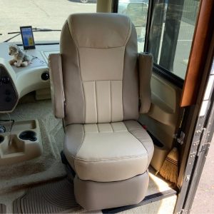 Custom RV captain chair seat covers installed in a 2016 Tiffin Allegro Open Road motorhome