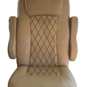 Close-up of tan vinyl seat cover with diamond stitch insert for 2016 Tiffin Allegro Open Road RV captain's chair