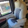 Custom RV captain chair seat covers installed with diamond stitching in a motorhome