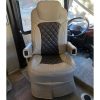 Custom RV captain chair seat covers installed on a motorhome driver seat with diamond stitching
