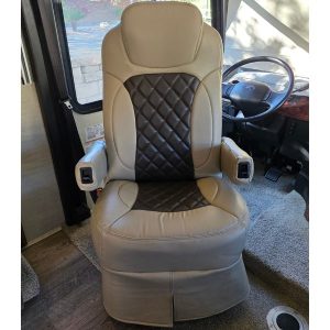 Custom RV captain chair seat covers installed on a motorhome driver seat with diamond stitching